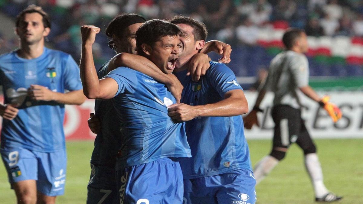 O'Higgins players celebrate a goal